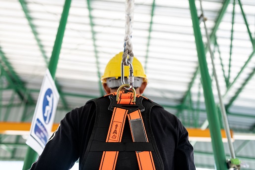 Construction,Worker,Wearing,Safety,Harness,And,Safety,Line,Working,At industrial safety barriers philadelphia
